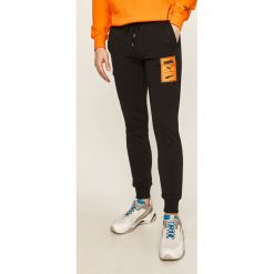 Puma - Spodnie. Czarne spodnie męskie Puma, na co dzień, s, z aplikacjami, z elastanu. Za 269,90 zł.