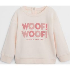 Mango Kids - Bluza dziecięca Woof 80-104 cm. Różowe bluzy dziewczęce Mango Kids, z nadrukiem, z bawełny, bez rękawów, bez kaptura. Za 45,90 zł.