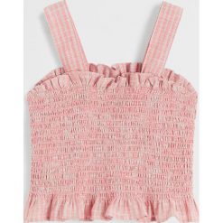 Mango Kids - Bluzka dziecięca Meri 116-164 cm. Różowe bluzki dziewczęce Mango Kids, bez wzorów, z bawełny, z okrągłym kołnierzem, bez rękawów, bez kaptura. Za 59,90 zł.