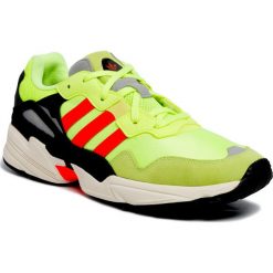 Buty adidas - EE7246 Hireye/Solred/Owhite. Żółte półbuty męskie Adidas, na co dzień, bez wzorów, ze skóry, bez zapięcia. Za 399,00 zł.