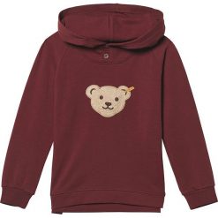 Bluza w kolorze ciemnoczerwonym. Czerwone bluzy niemowlęce Steiff, z aplikacjami, bez rękawów, bez kaptura. W wyprzedaży za 68,95 zł.