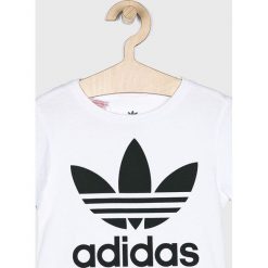 Adidas Originals - Top dziecięcy 104-128 cm. Białe bluzki dziewczęce z nadrukiem, z bawełny, z okrągłym kołnierzem, krótkie. Za 69,90 zł.
