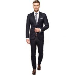 Garnitur wind 311 granatowy slim fit. Niebieskie garnitury męskie Recman, bez wzorów. Za 1299,00 zł.