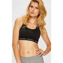 Triumph - Biustonosz. Czarne biustonosze sportowe damskie Triumph, s, bez wzorów, z elastanu. W wyprzedaży za 129,90 zł.