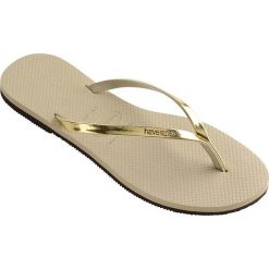 Havaianas - Japonki. Żółte klapki damskie Havaianas, bez wzorów, ze skóry, bez obcasa, na obcasie. W wyprzedaży za 99,90 zł.