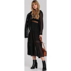 Czarna Sukienka Driscoll. Czarne sukienki damskie Renee, s, w paski, długie, mini, rozkloszowane. Za 129,99 zł.