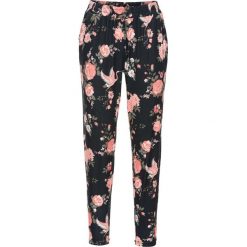 Spodnie jogger bonprix koralowy w kwiaty. Różowe spodnie damskie bonprix. Za 79,99 zł.