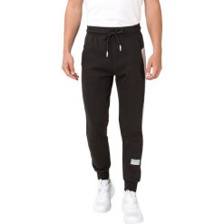 Puma Avenir Spodnie dresowe Czarny. Czarne spodnie męskie Puma, xl, bez wzorów, z bawełny. Za 326,95 zł.