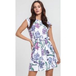 Biało-Niebieska Sukienka Springtime. Białe sukienki damskie other, na imprezę, s, bez wzorów, klasyczne, bez kołnierzyka, bez rękawów, mini. Za 69,99 zł.