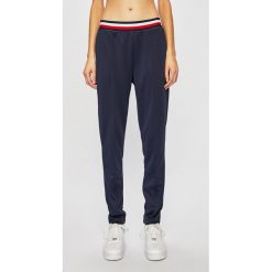Tommy Sport - Spodnie. Niebieskie spodnie damskie Tommy Sport, s, bez wzorów, z poliesteru. W wyprzedaży za 249,90 zł.