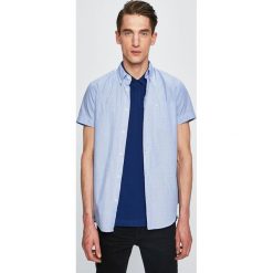 Wrangler - Koszula. Niebieskie koszule męskie Wrangler, s, bez wzorów, z bawełny, casualowe, button down, z krótkim rękawem. W wyprzedaży za 79,90 zł.
