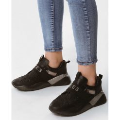 Czarne Sneakersy Unflinchingly. Czarne sneakersy damskie marki Born2be, z materiału. Za 99,99 zł.