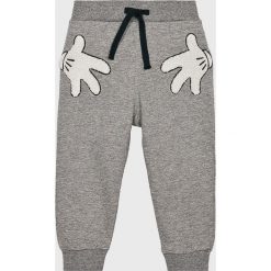 Name it - Spodnie dziecięce 80-110 cm. Niebieskie spodnie chłopięce Name it, bez wzorów, z bawełny, casualowe. W wyprzedaży za 49,90 zł.