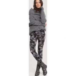 Ciemnoszare-Moro Legginsy Creative. Szare legginsy other, l, moro. Za 29,99 zł.