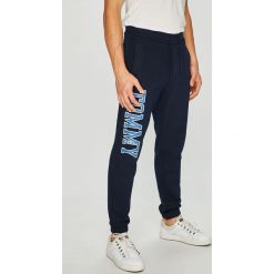 Tommy Jeans - Spodnie. Szare spodnie męskie Tommy Jeans, na co dzień, s, bez wzorów, z elastanu, casualowe. W wyprzedaży za 239,90 zł.