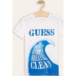 Guess Jeans - T-shirt dziecięcy 118-175 cm. Białe t-shirty chłopięce Guess Jeans, z nadrukiem, z bawełny, bez rękawów. W wyprzedaży za 79,90 zł.