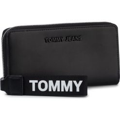 Duży Portfel Damski TOMMY JEANS - Tjw Femme Pu Large Za Wallet AW0AW07160 BDS. Czarne portfele damskie Tommy Jeans, bez wzorów, z jeansu. Za 269,00 zł.