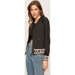 Guess Jeans - Bluza. Czarne bluzy damskie Guess Jeans, s, z aplikacjami, z elastanu, bez rękawów, bez kaptura. W wyprzedaży za 339,90 zł.