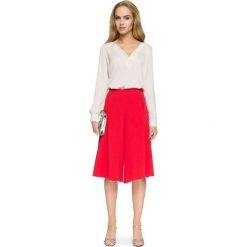 DESIREE Bluzka z dekoltem V - beżowa. Brązowe bluzki damskie Stylove, s, bez wzorów, z elastanu, eleganckie, bez kołnierzyka, bez rękawów. Za 139,00 zł.