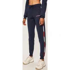 Tommy Sport - Spodnie. Niebieskie spodnie damskie Tommy Sport, s, bez wzorów, z elastanu. W wyprzedaży za 319,90 zł.