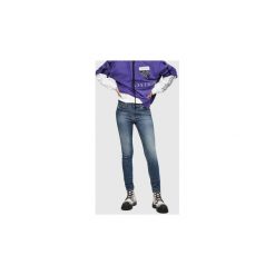 Jeansy skinny Diesel SLANDY. Niebieskie jeansy damskie Diesel, bez wzorów, z jeansu. Za 475,76 zł.