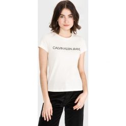 Calvin Klein Koszulka Żółty. Żółte koszulki damskie Calvin Klein, l, z nadrukiem, z bawełny, bez kołnierzyka, z krótkim rękawem. Za 154,95 zł.
