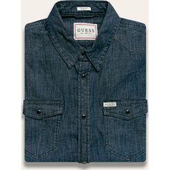 Guess Jeans - Koszula. Niebieskie koszule męskie Guess Jeans, s, z aplikacjami, z elastanu, klasyczne, z klasycznym kołnierzykiem, z długim rękawem. W wyprzedaży za 299,90 zł.