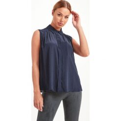 KOSZULA BISOUS SPORTMAX CODE. Koszule damskie Sportmax Code, bez wzorów, eleganckie, bez kołnierzyka, bez rękawów. Za 1289,00 zł.