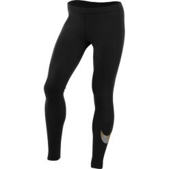 Legginsy Nike Flash Essential Tights W Czarne. Czarne spodnie damskie Nike, bez wzorów, z materiału, do biegania, dri-fit (nike). Za 119,99 zł.