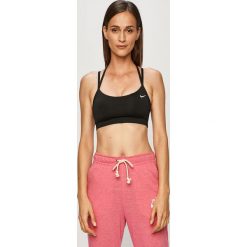 Nike - Biustonosz sportowy. Czarne biustonosze sportowe damskie Nike, s, bez wzorów, z elastanu, dri-fit (nike). Za 129,90 zł.