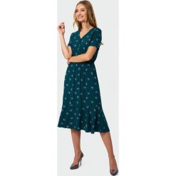 Sukienka midi w kwiaty - 40. Sukienki damskie e-margeritka.pl, w kwiaty, z tkaniny, biznesowe, z długim rękawem, długie, bez kaptura. Za 129,99 zł.