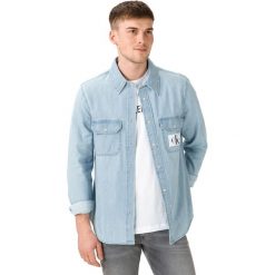 Calvin Klein Koszula Niebieski. Niebieskie koszule męskie Calvin Klein, xl, bez wzorów, z bawełny, bez kołnierzyka, z długim rękawem. Za 445,95 zł.