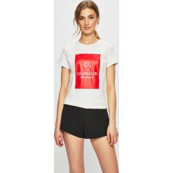 Calvin Klein Performance - Top. Czarne bluzki damskie Calvin Klein Performance, s, z nadrukiem, z bawełny, z okrągłym kołnierzem. Za 199,90 zł.