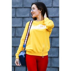 Damska bluza EXCITING YELLOW. Żółte bluzy sportowe damskie Damska bluza EXCITING YELLOW, s, z napisami, z długim rękawem, długie, bez kaptura. W wyprzedaży za 49,00 zł.