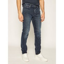 Jeansy Skinny Fit Tommy Jeans Simon DM0DM08012. Niebieskie jeansy męskie Tommy Jeans, m, bez wzorów, z elastanu. W wyprzedaży za 359,00 zł.