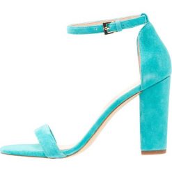 ALDO MYLY Sandały na obcasie turquoise. Niebieskie rzymianki damskie ALDO, z materiału, na obcasie. Za 359,00 zł.