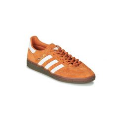 Buty adidas HANDBALL SPEZIAL. Pomarańczowe trampki męskie Adidas, bez wzorów, bez zapięcia. Za 429,00 zł.