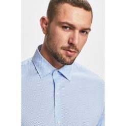 Pierre Cardin - Koszula. Niebieskie koszule męskie marki Pierre Cardin, bez wzorów, z elastanu, eleganckie, z włoskim kołnierzykiem, z długim rękawem. Za 329,90 zł.