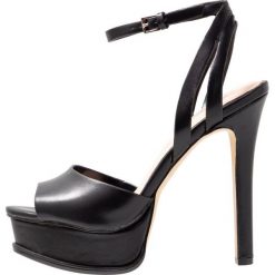 ALDO EOWELASSA Sandały na obcasie black. Czarne rzymianki damskie ALDO, z materiału, na obcasie. Za 359,00 zł.