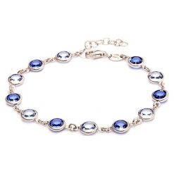 Srebrna bransoletka z kryształami Swarovski. Szare bransoletki damskie marki Ania Kruk, z materiału, z kryształem, srebrne. W wyprzedaży za 109,95 zł.