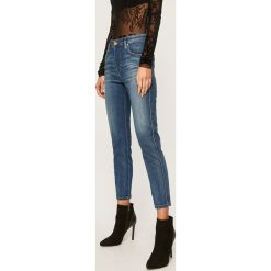 Diesel - Jeansy Babhila. Niebieskie rurki damskie Diesel, s, z aplikacjami, z elastanu. Za 699,90 zł.