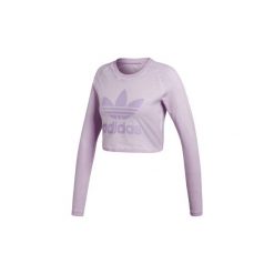 Bluzki adidas Krótka koszulka z długim rękawem. Fioletowe koszulki damskie marki Adidas, bez wzorów, bez kołnierzyka, z długim rękawem. Za 249,00 zł.