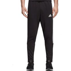 Adidas Must Haves 3-Stripes Tiro Pants DT9901 spodnie męskie czarne M. Czarne spodnie męskie Adidas, na co dzień, m, w paski, z bawełny, klasyczne. W wyprzedaży za 169,99 zł.