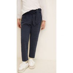 Mango Kids - Spodnie dziecięce Bayona 116-164 cm. Niebieskie spodnie dziewczęce marki Mango Kids, bez wzorów, z poliesteru, casualowe. Za 79,90 zł.