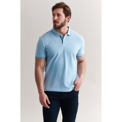 Koszulka polo w kolorze niebieskim. Niebieskie koszulki męskie TATUUM, s, bez wzorów, z bawełny, polo, bez rękawów. W wyprzedaży za 79,95 zł.