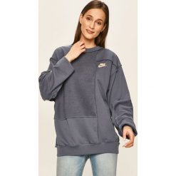 Nike Sportswear - Bluza. Fioletowe bluzy damskie Nike Sportswear, s, z nadrukiem, z bawełny, bez rękawów, bez kaptura. W wyprzedaży za 219,90 zł.