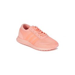 Buty Dziecko adidas LOS ANGELES J. Pomarańczowe trampki dziewczęce Adidas, bez wzorów, bez zapięcia. Za 247,20 zł.