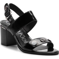 Sandały CALVIN KLEIN - Nicoletta Box Smooth E8891 Black. Czarne klapki damskie Calvin Klein, z aplikacjami, ze skóry ekologicznej, bez obcasa, na obcasie. Za 729,00 zł.