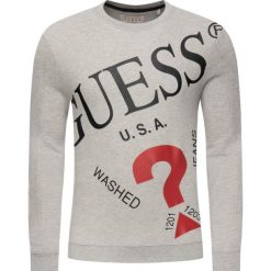 Bluza Guess Huffie M93Q33 K8S40. Białe bluzy męskie Guess, s, z aplikacjami, bez kołnierzyka, bez rękawów, bez kaptura. W wyprzedaży za 219,00 zł.
