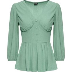 Shirt ze strukturalnego materiału bonprix zielony pastelowy. Zielone t-shirty damskie bonprix, bez wzorów, z dekoltem w serek. Za 59,99 zł.